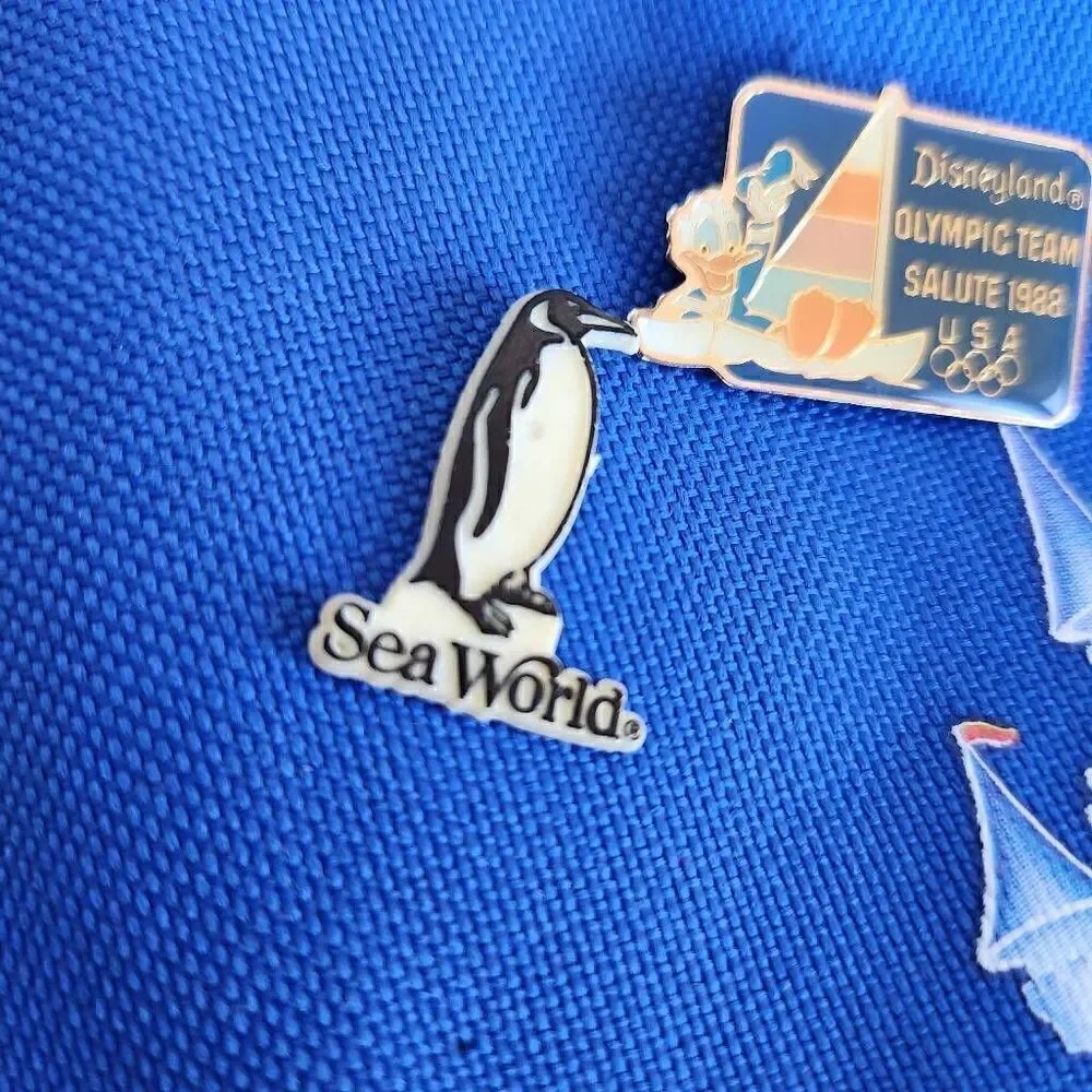 90s Disneyland one sling backpack 2 80's Disney pins penguin Sea World vintage